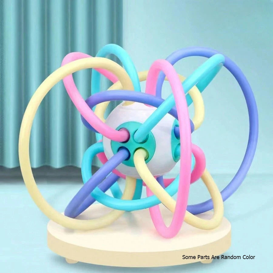 Baby Grip Training Ball — Manhattan Hand Rattle & Food-Grade Teether