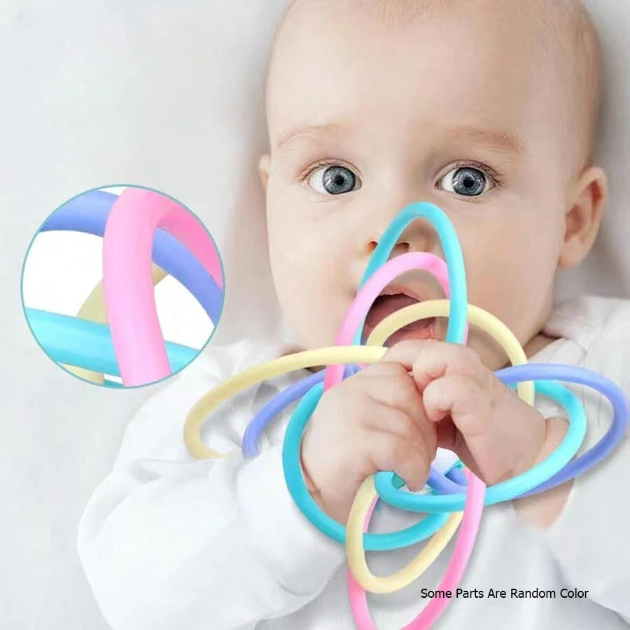 Baby Grip Training Ball — Manhattan Hand Rattle & Food-Grade Teether